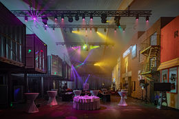 Rantastic Naxpro-Truss trusses alongside shipping containers